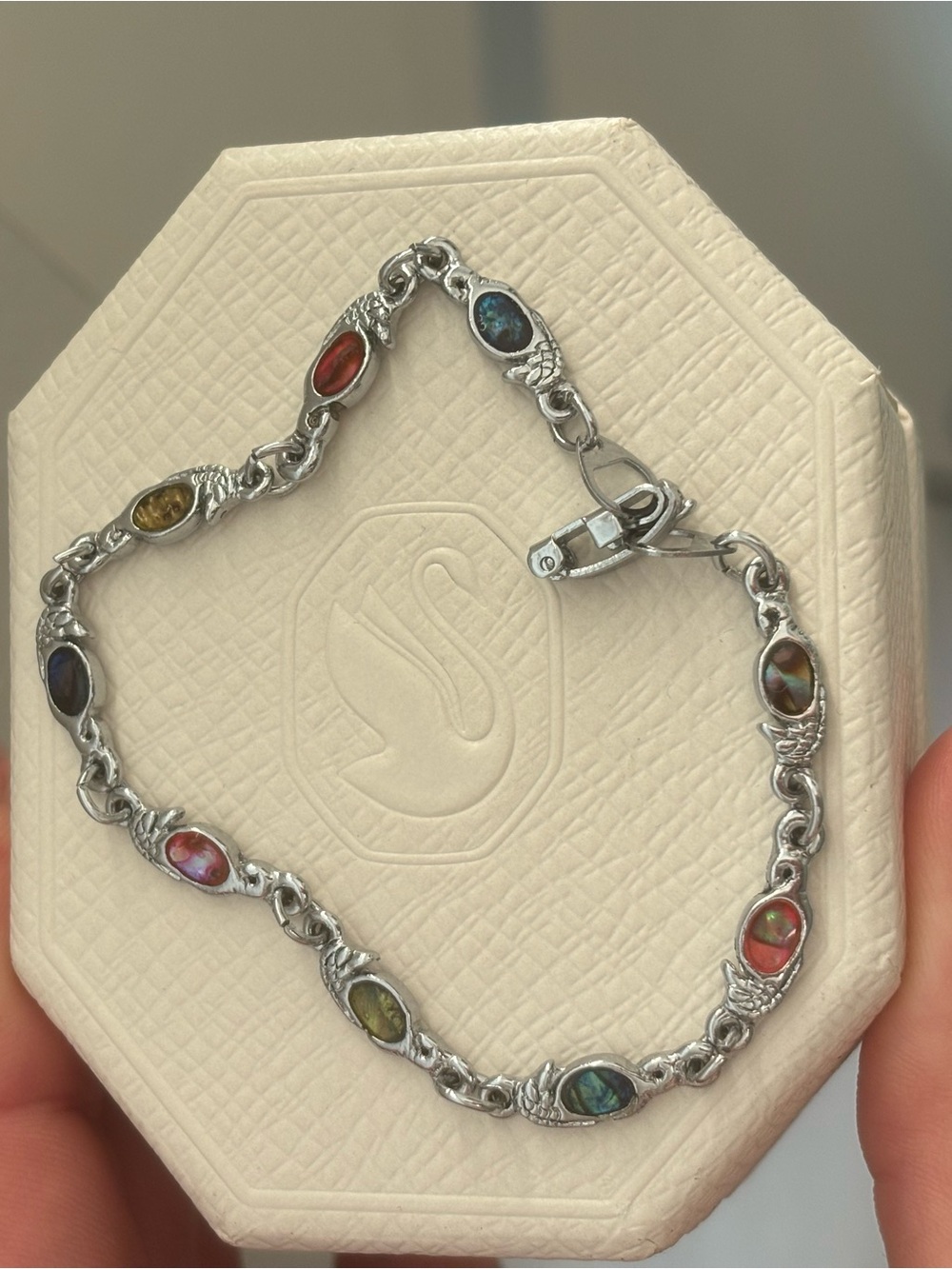 SJ silver toned seahorse bracelet with multi colour stones